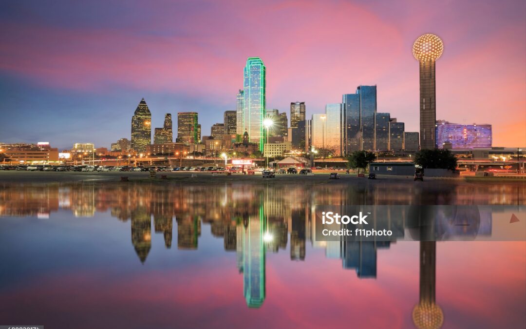 Dallas skyline reflected in Trinity river at sunset, Texas